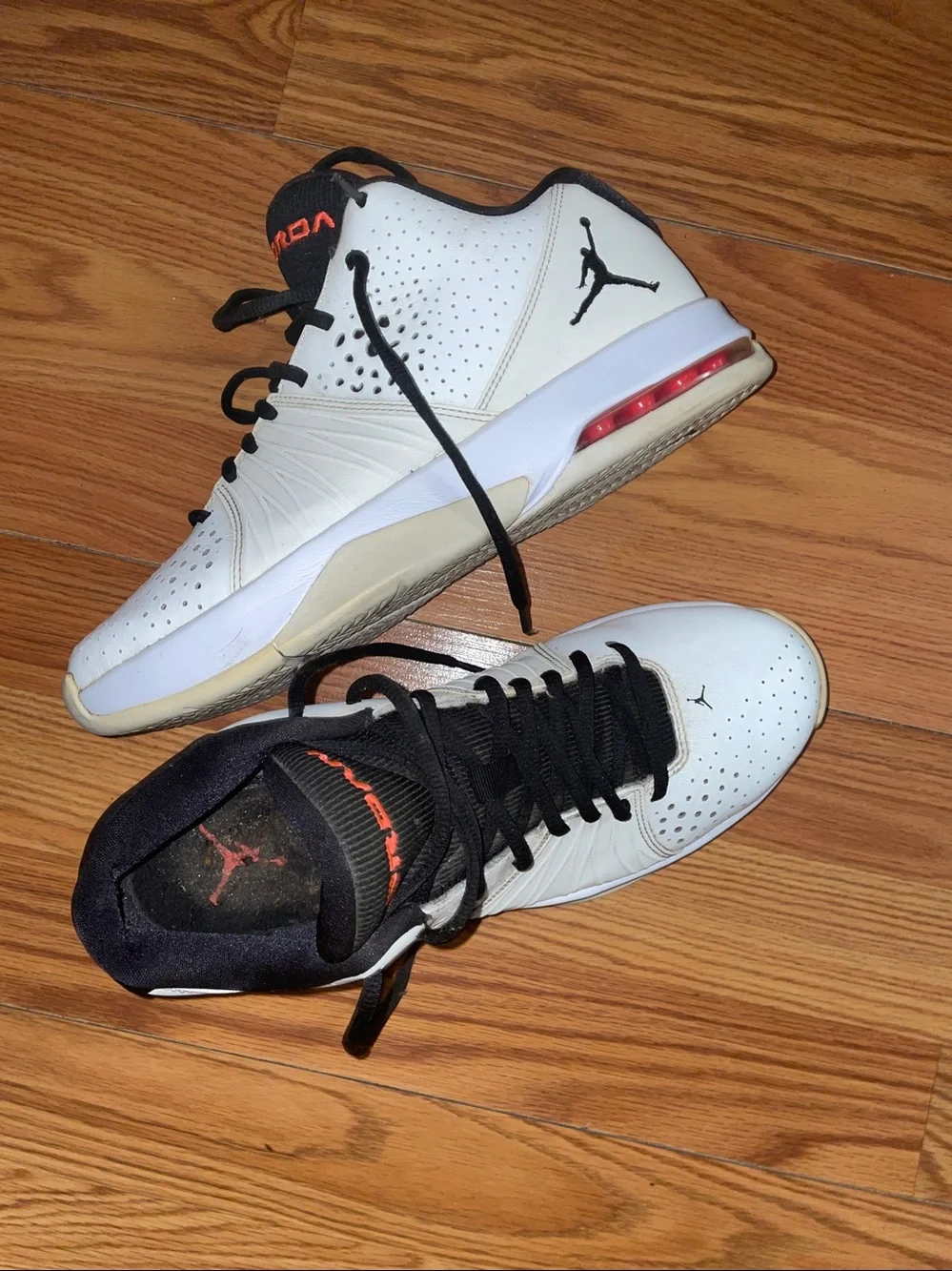 Jordan Men’s White Basketball Sneakers with Black Trim and Red Air Detail